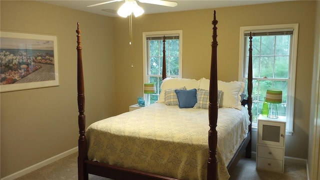 3962 Fox Glen Dr, Woodstock, GA 30189 - bedroom featuring carpet floors and a ceiling fan