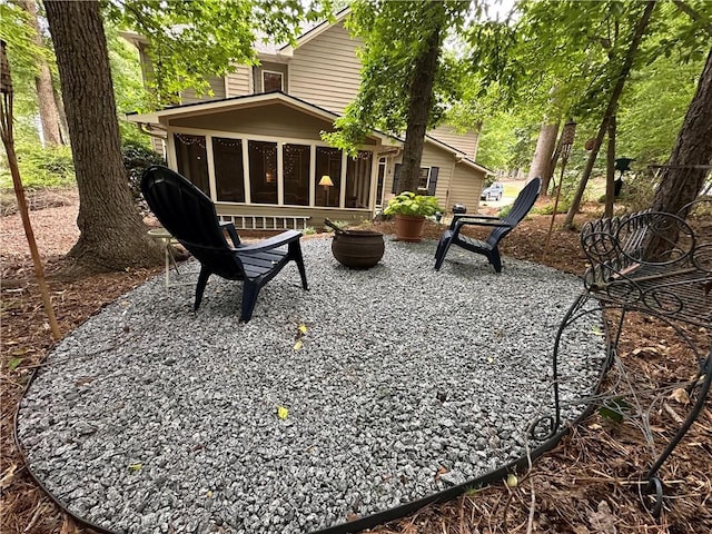 3962 Fox Glen Dr, Woodstock, GA 30189 - view of patio / terrace with a sunroom