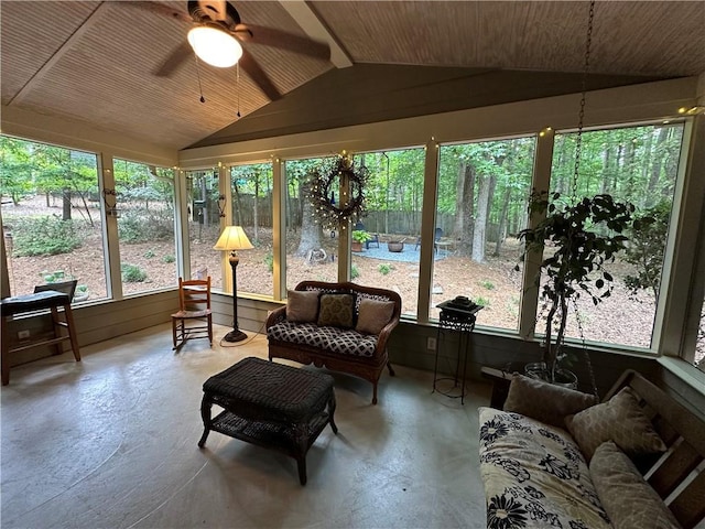 3962 Fox Glen Dr, Woodstock, GA 30189 - sunroom with finished concrete flooring, vaulted ceiling, ceiling fan, and outdoor lounge area