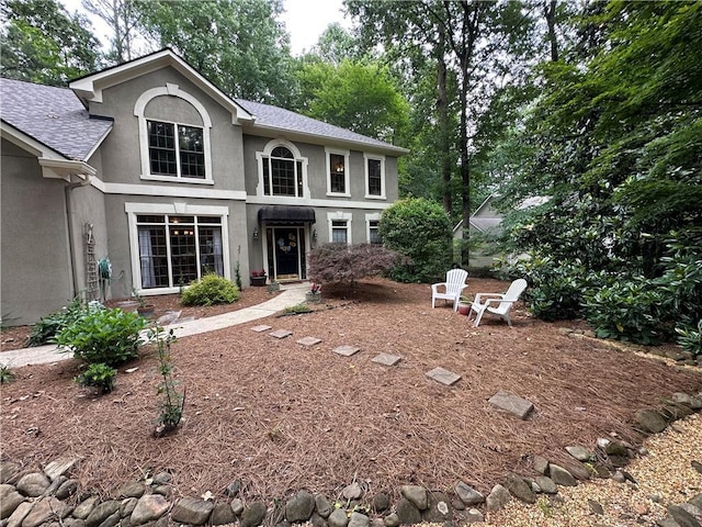 3962 Fox Glen Dr, Woodstock, GA 30189 - traditional-style house with stucco siding and a shingled roof
