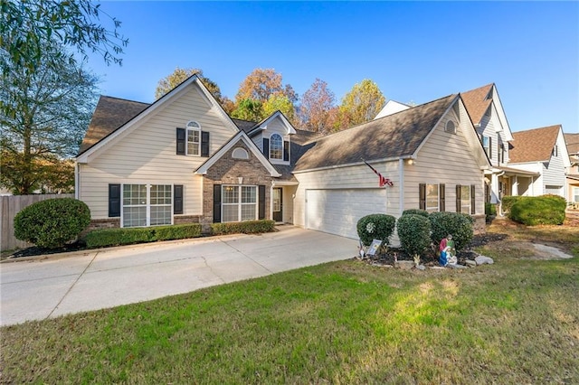 view of front facade with a front lawn and a garage