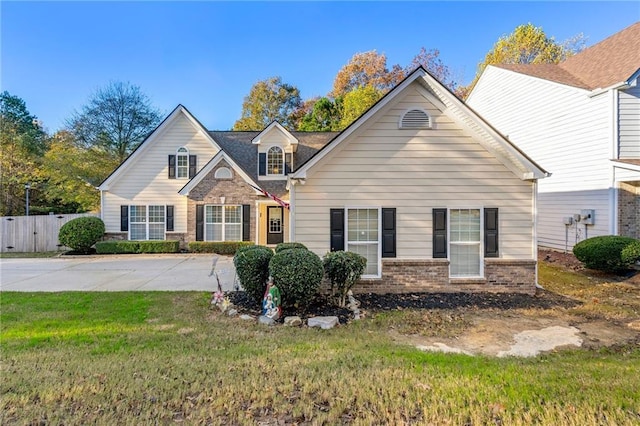 view of front of home with a front lawn