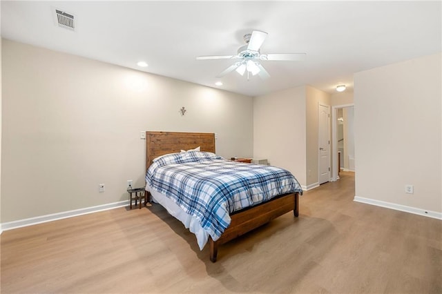 bedroom featuring light wood-type flooring and ceiling fan