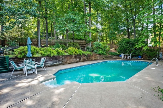 2610 Chadwick Rd, Marietta, GA 30066 - view of swimming pool featuring a patio, a fenced backyard, and view of scattered trees