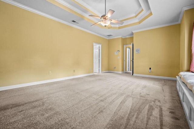 2610 Chadwick Rd, Marietta, GA 30066 - carpeted spare room featuring a tray ceiling, crown molding, a ceiling fan, and baseboards