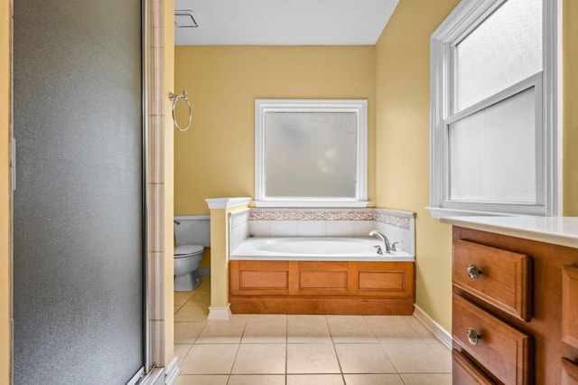 2610 Chadwick Rd, Marietta, GA 30066 - bathroom with toilet, tile patterned floors, a shower stall, baseboards, and a bath
