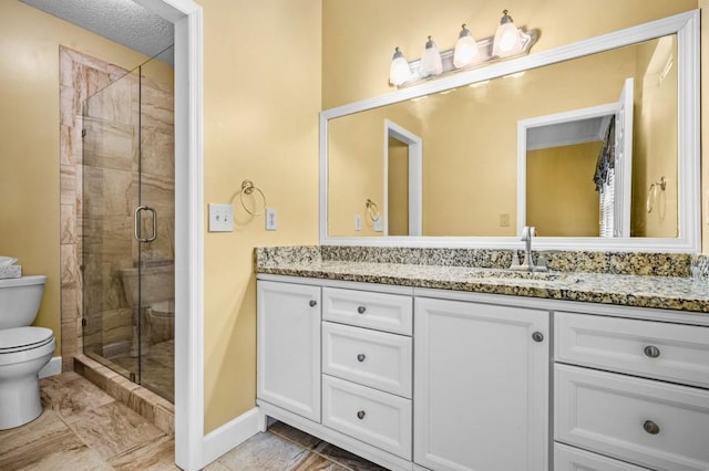2610 Chadwick Rd, Marietta, GA 30066 - full bathroom featuring toilet, vanity, a stall shower, and baseboards
