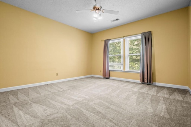 2610 Chadwick Rd, Marietta, GA 30066 - carpeted empty room with baseboards, ceiling fan, and a textured ceiling