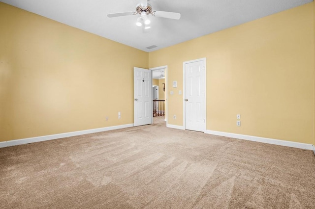 2610 Chadwick Rd, Marietta, GA 30066 - unfurnished bedroom with carpet floors, baseboards, and a ceiling fan