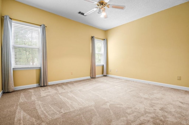 2610 Chadwick Rd, Marietta, GA 30066 - unfurnished room with ceiling fan, carpet flooring, baseboards, and a textured ceiling