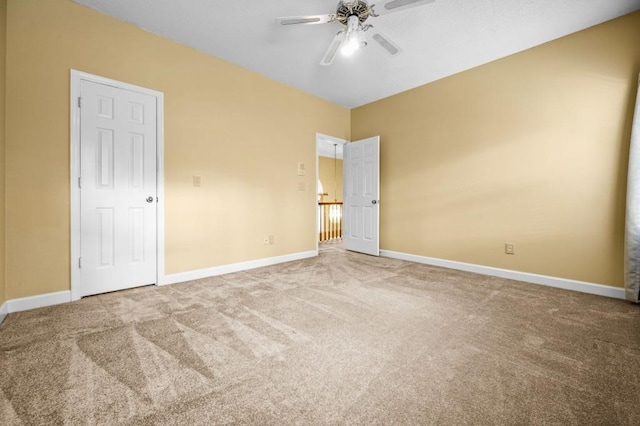 2610 Chadwick Rd, Marietta, GA 30066 - unfurnished bedroom featuring carpet, baseboards, and a ceiling fan