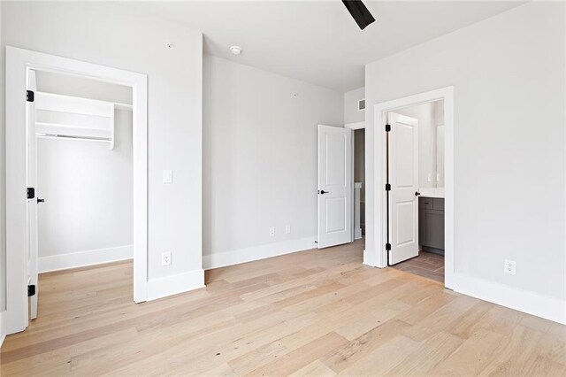7210 Summit Pl, Alpharetta, GA 30009 - empty room featuring light wood finished floors, baseboards, and a ceiling fan