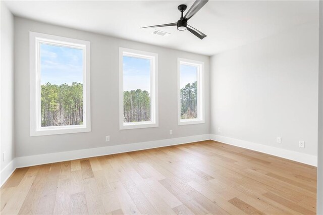 7210 Summit Pl, Alpharetta, GA 30009 - empty room featuring light wood-type flooring, baseboards, and ceiling fan