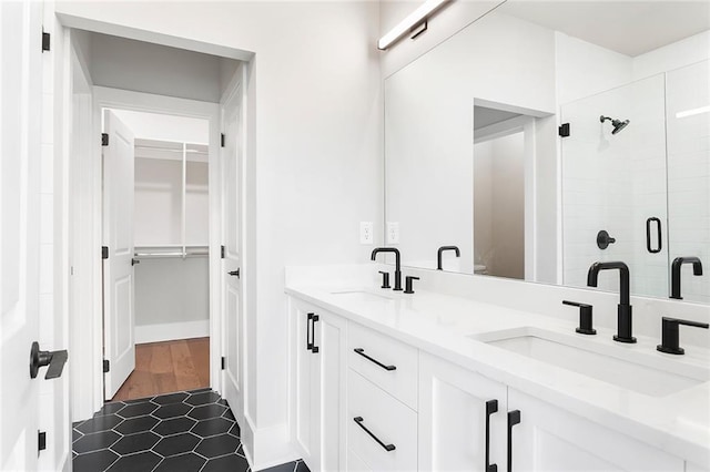 7210 Summit Pl, Alpharetta, GA 30009 - full bathroom with a shower stall, tile patterned flooring, double vanity, and a walk in closet