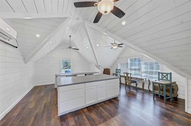 additional living space with lofted ceiling, wooden walls, wooden ceiling, and dark hardwood / wood-style flooring