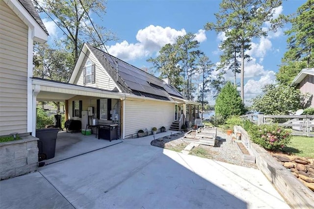 view of home's exterior featuring a patio