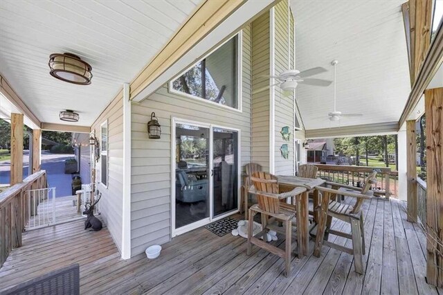 wooden terrace with ceiling fan