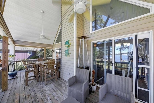 wooden deck with ceiling fan