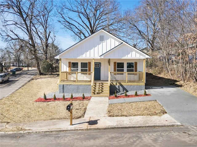 view of front facade with a porch and board and batten siding