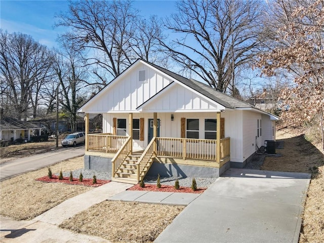 view of front of home featuring central AC unit and covered porch