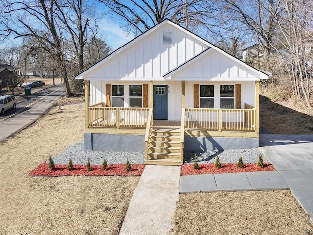 view of front of property featuring covered porch and board and batten siding