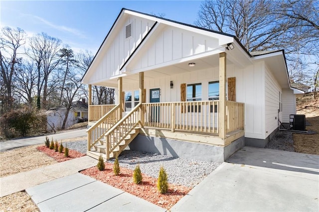 view of front facade with covered porch and central air condition unit