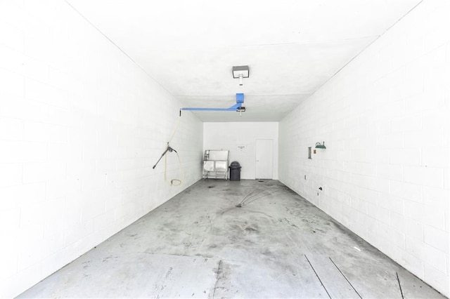 199 14th St NE Unit 1209, Atlanta, GA 30309 - garage featuring concrete block wall