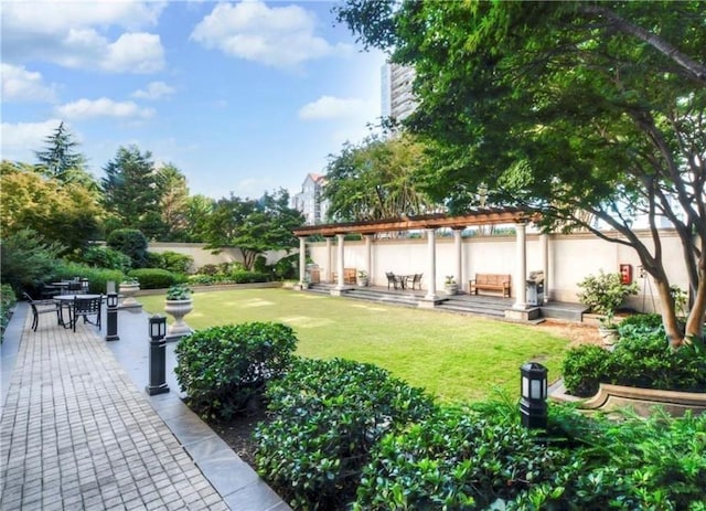 199 14th St NE Unit 1209, Atlanta, GA 30309 - view of yard with a pergola, a patio, and outdoor dining space
