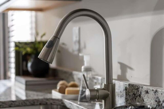235 Ivey Ter, Temple, GA 30179 - kitchen view of arched walkways and a sink