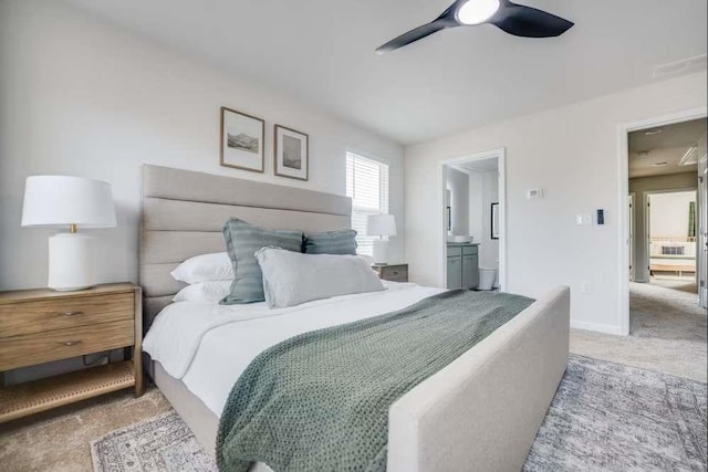 235 Ivey Ter, Temple, GA 30179 - carpeted bedroom featuring ensuite bath, ceiling fan, and baseboards