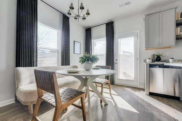 235 Ivey Ter, Temple, GA 30179 - dining room featuring baseboards, a chandelier, and light wood-style floors