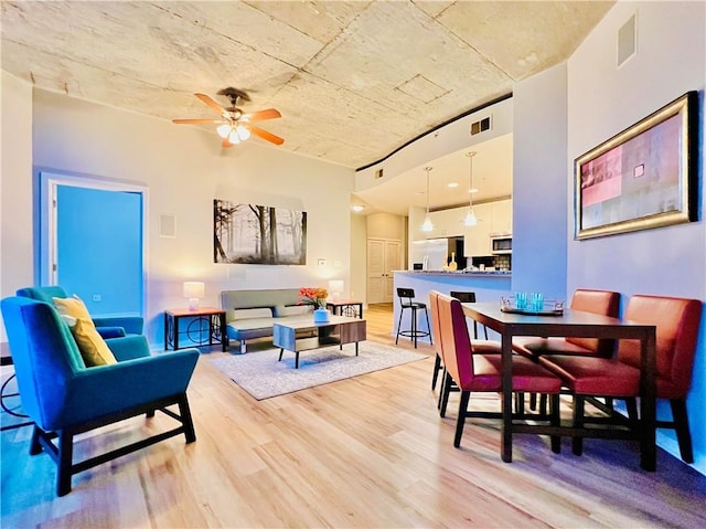 400 W Peachtree St NW Unit 2704, Atlanta, GA 30308 - living area with light wood-type flooring and ceiling fan