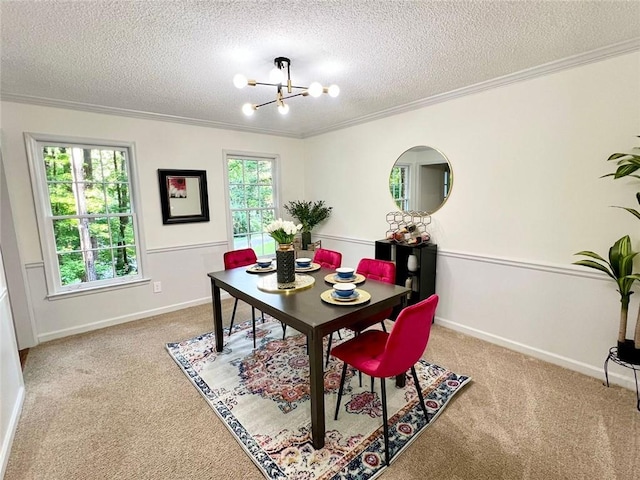 1461 Fox Forest Ter SW, Lilburn, GA 30047 - dining area with carpet flooring, a chandelier, crown molding, a textured ceiling, and baseboards