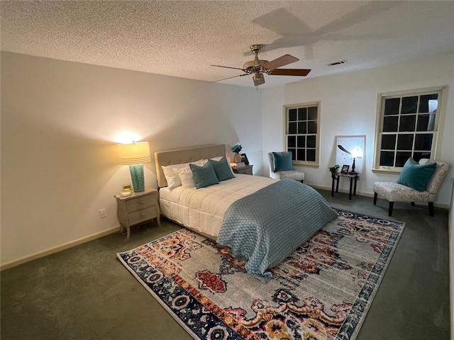 1461 Fox Forest Ter SW, Lilburn, GA 30047 - bedroom featuring carpet flooring, a ceiling fan, a textured ceiling, and baseboards