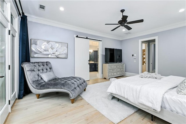 6225 Random Winds Blf, Gainesville, GA 30506 - bedroom featuring a barn door, light wood-type flooring, ornamental molding, recessed lighting, and ceiling fan