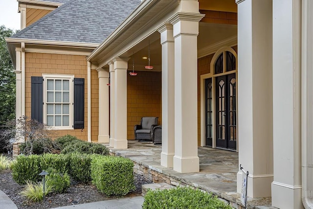 6225 Random Winds Blf, Gainesville, GA 30506 - doorway to property featuring a shingled roof and covered porch