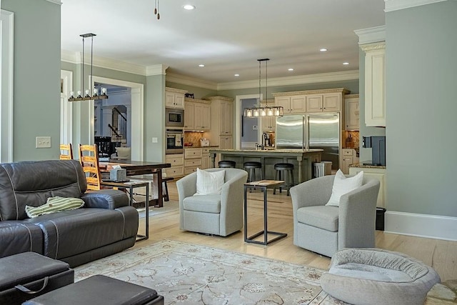 6225 Random Winds Blf, Gainesville, GA 30506 - living area featuring light wood-type flooring, a chandelier, crown molding, and recessed lighting
