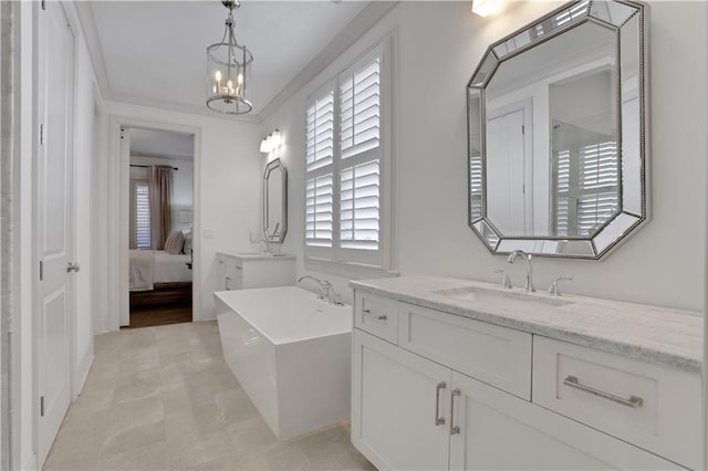 2620 Middle Coray Cir, Marietta, GA 30066 - bathroom featuring crown molding, a freestanding bath, ensuite bathroom, an inviting chandelier, and vanity