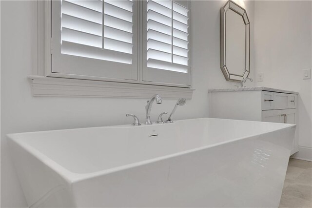 2620 Middle Coray Cir, Marietta, GA 30066 - bathroom with vanity and a freestanding tub