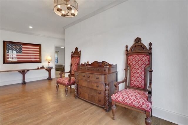 2620 Middle Coray Cir, Marietta, GA 30066 - sitting room with ornamental molding, wood finished floors, recessed lighting, baseboards, and a chandelier