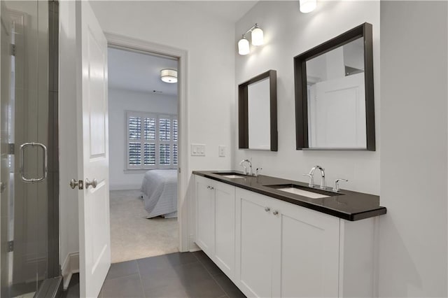 2620 Middle Coray Cir, Marietta, GA 30066 - full bathroom featuring tile patterned flooring, a shower stall, double vanity, and a sink