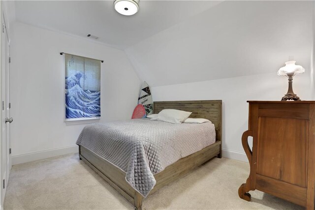 2620 Middle Coray Cir, Marietta, GA 30066 - bedroom featuring visible vents, lofted ceiling, light colored carpet, and baseboards
