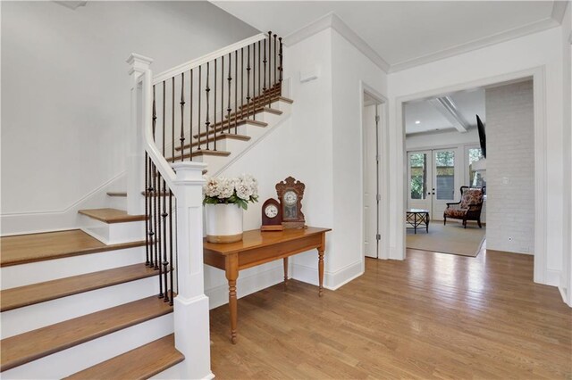 2620 Middle Coray Cir, Marietta, GA 30066 - staircase featuring wood finished floors, baseboards, french doors, and ornamental molding