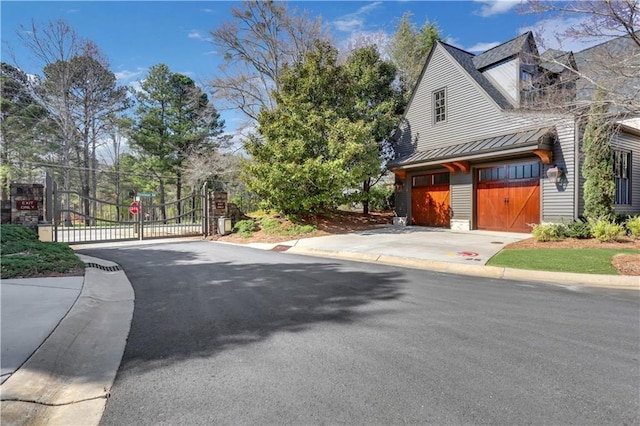 2620 Middle Coray Cir, Marietta, GA 30066 - exterior space with a gated entry, curbs, traffic signs, and a gate