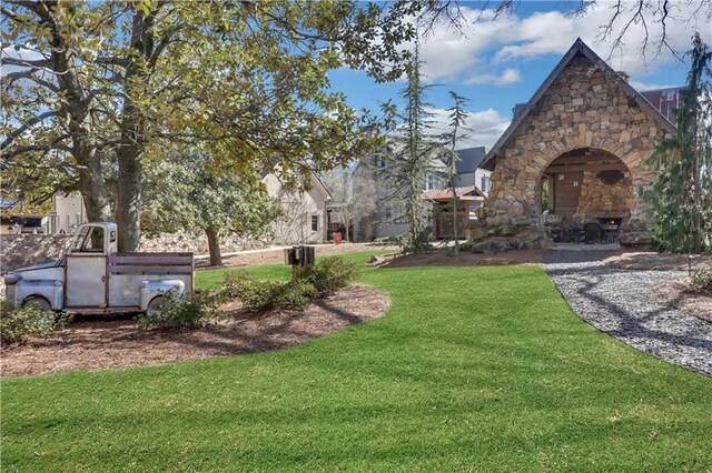 2620 Middle Coray Cir, Marietta, GA 30066 - view of yard featuring an outdoor stone fireplace