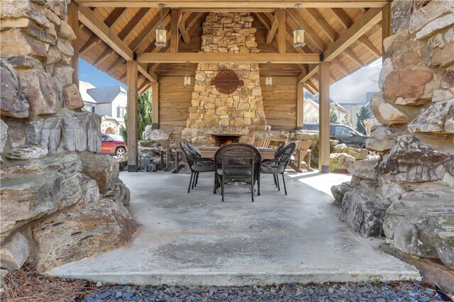 2620 Middle Coray Cir, Marietta, GA 30066 - view of patio / terrace with a gazebo, outdoor dining area, and an outdoor stone fireplace