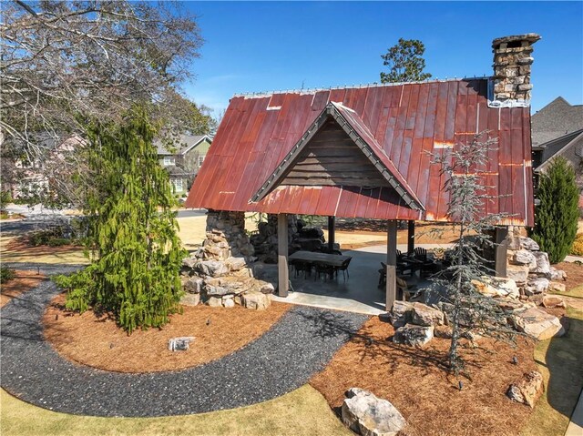 2620 Middle Coray Cir, Marietta, GA 30066 - view of side of property with a gazebo and metal roof