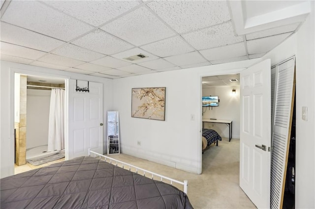 carpeted bedroom with a closet