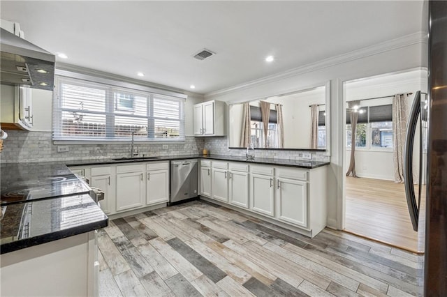 kitchen featuring light wood-type flooring, dishwasher, sink, and white cabinetry