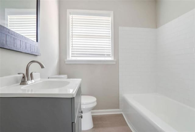 2945 Catalina Dr, Decatur, GA 30032 - bathroom featuring baseboards, vanity, and toilet